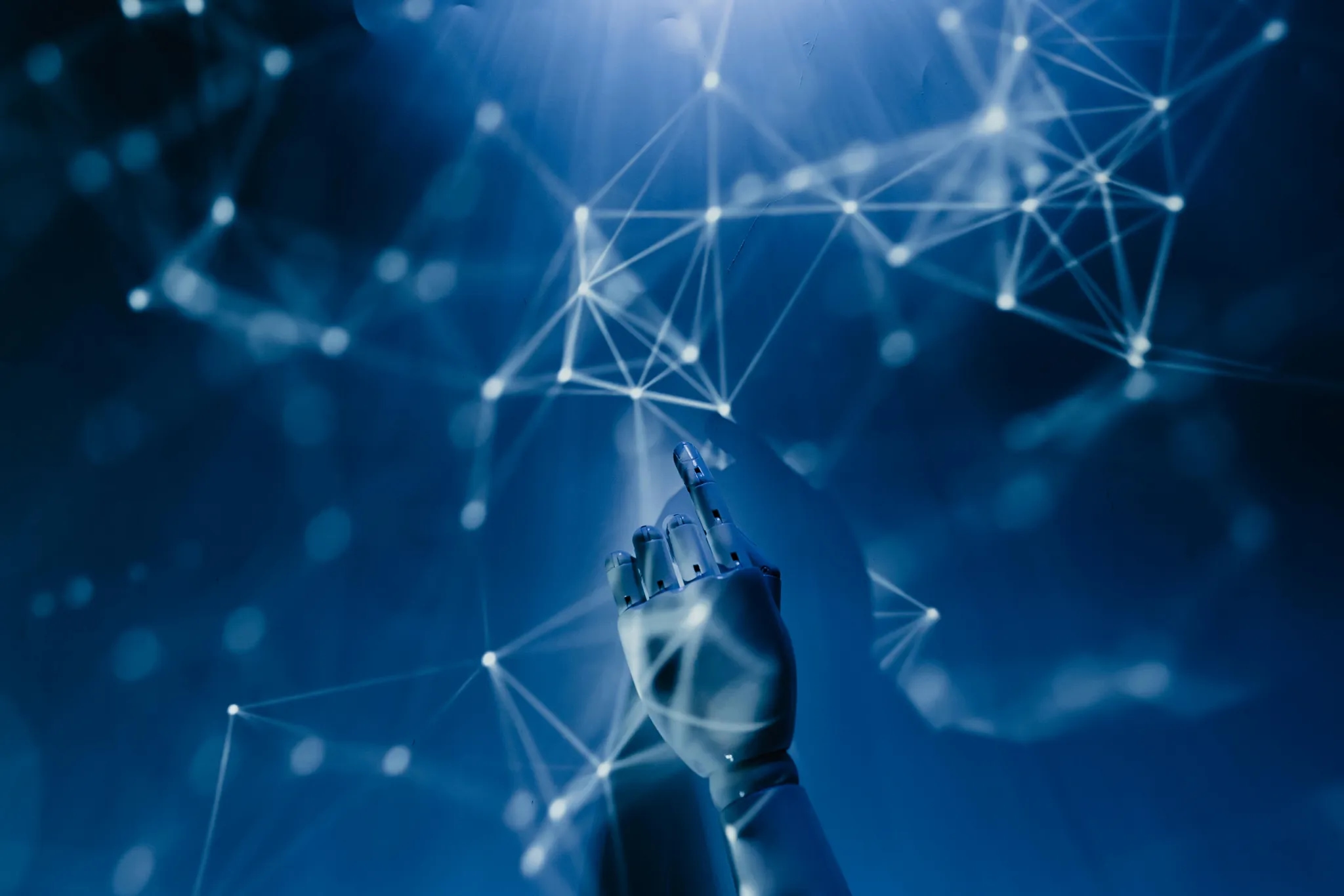 Robot hand touching a digital network of connected points