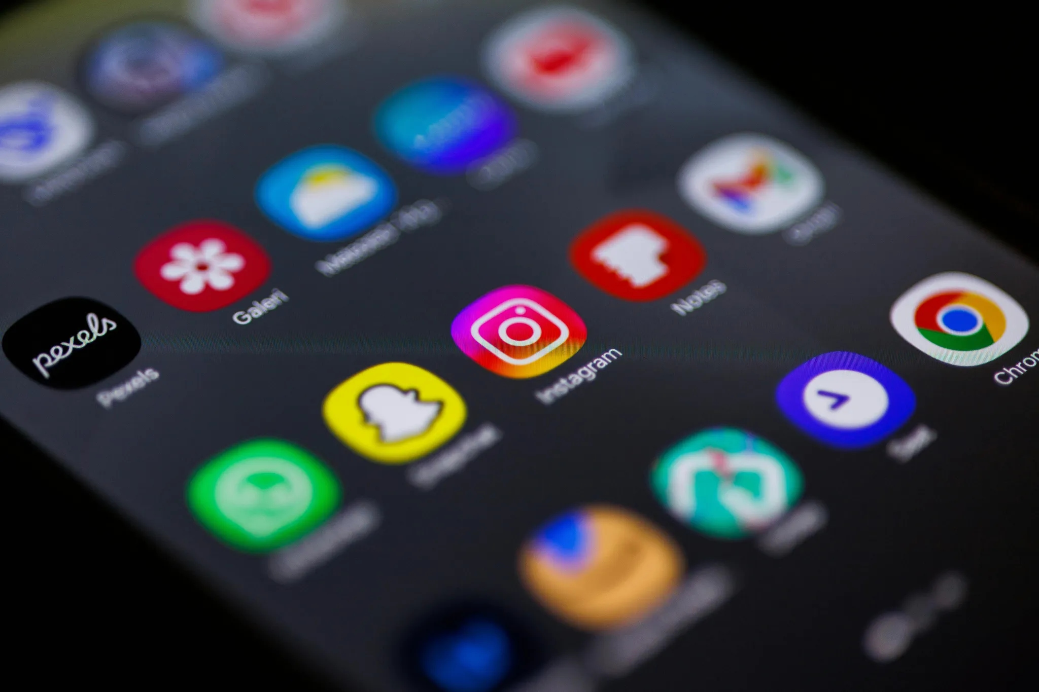 Close-up van app-iconen op het scherm van een smartphone